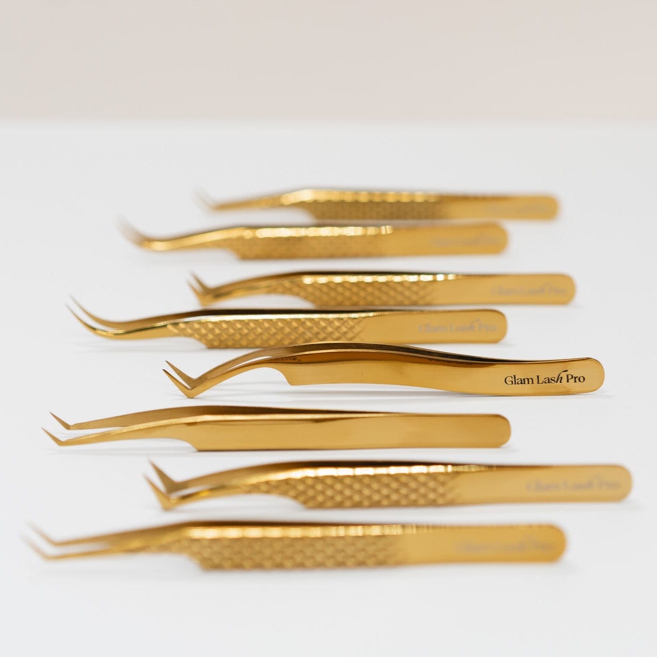 diamond grip tweezer in gold